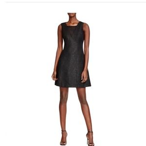 Metallic black a-line midi dress with mesh panel.